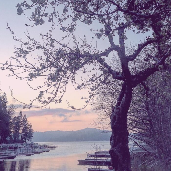 snow dusting over lake arrowhead sunset