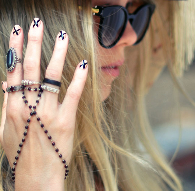 1 nude black nails with xs