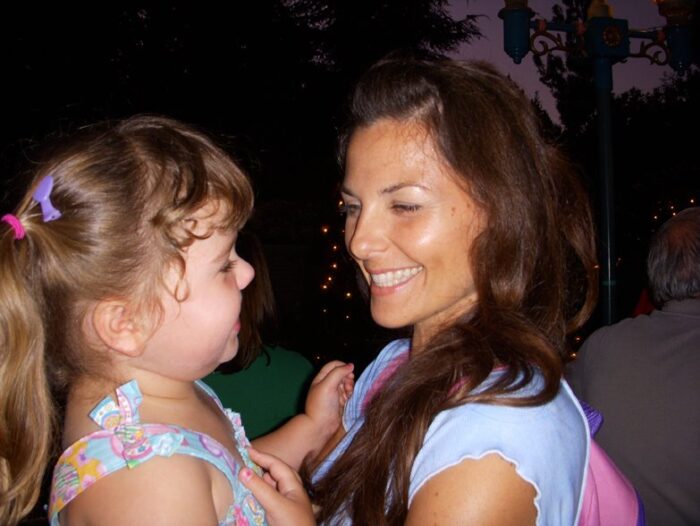 cute mom and daughter photos at disneyland, brunette