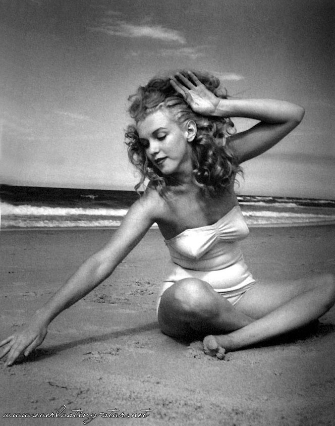 black and white photo of marilyn monron norma jean on the beach