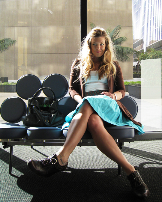 teal skirt, white t-shirt, brown sweater, brown lace up wedges, 2009 spring style, marshmellow couch, art gallery, love maegan