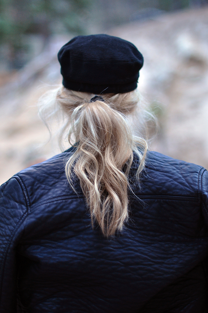 wool cap and blonde ponytail