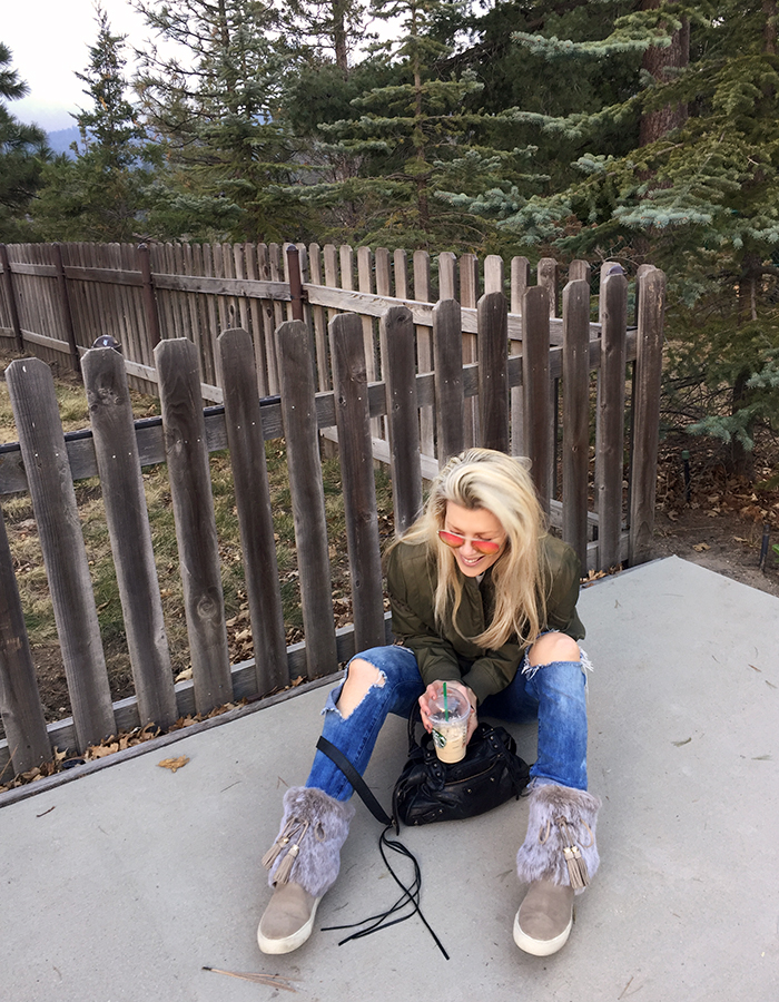 tinted shades-aviators-bomber jacket-furry boots-jeans