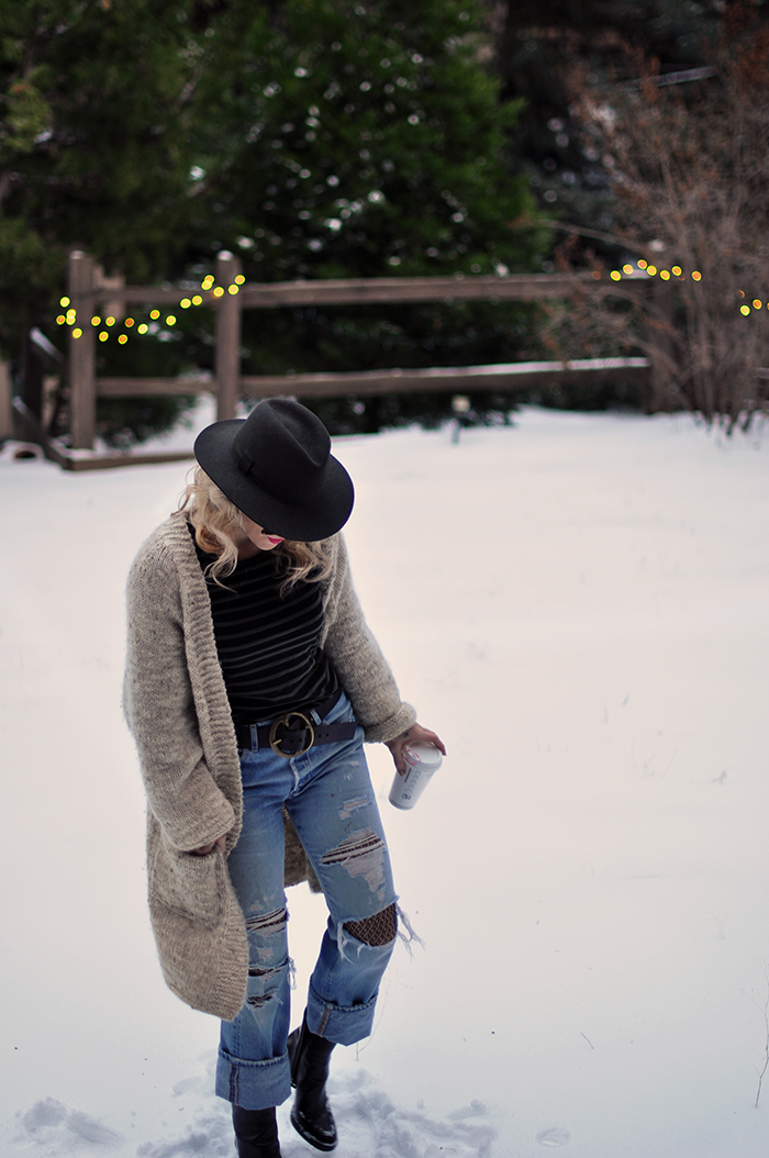 snow style, vintage levi's with fishnets, oversized cardigan, striped tee, wool fedora