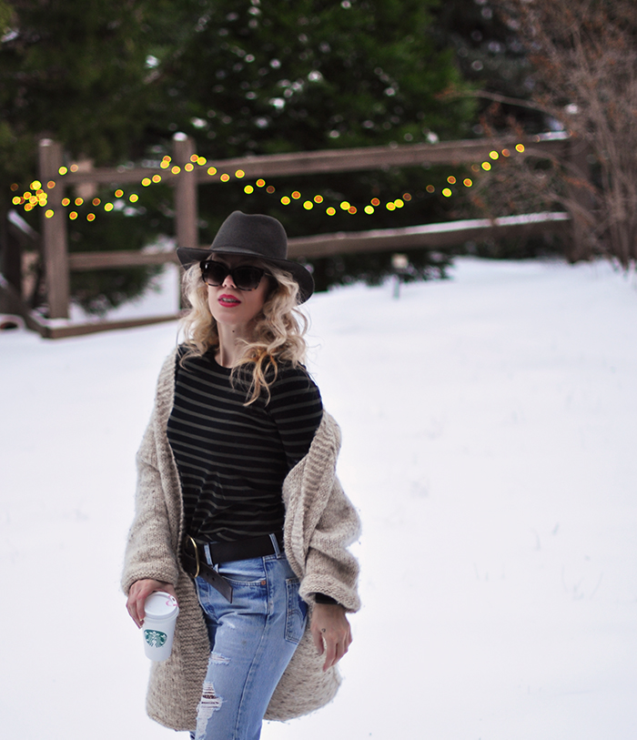 snow style, vintage levi's with fishnets, oversized cardigan, striped tee, wool fedora