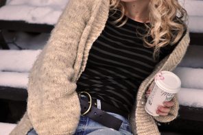 casual style in the snow-oversized cardigan-vintage levis-striped long sleeve tee-hat-red lips