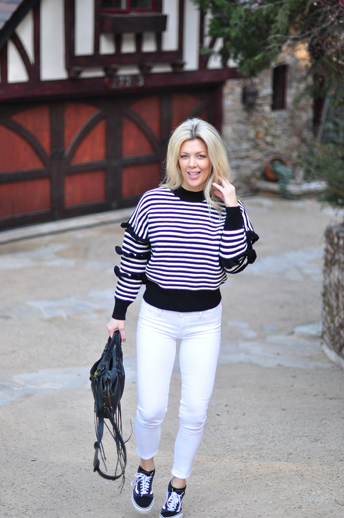 black and white outfit-striped sweater, white jeans, vans