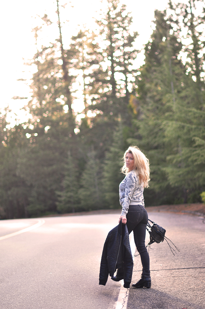 on the road, among the tall trees, in lake arrowhead, camo sweater, black jeans, easy style outfit, love maegan tintari