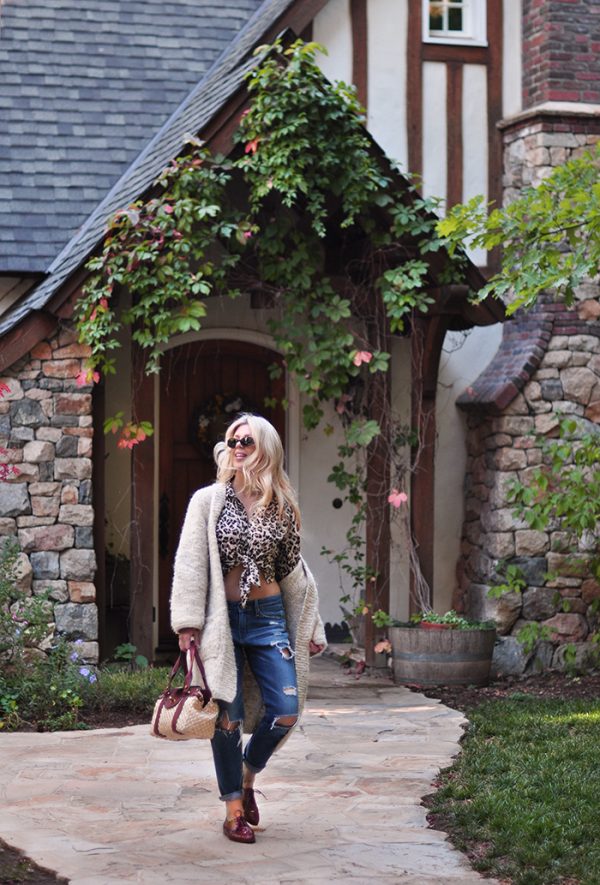 storybook house-boyfriend jeans -tied up leopard blouse-oversized cardigan-lace up flats-trotters shoes