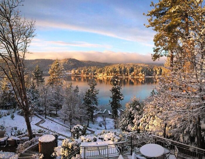 snowing on the lake in lake arrowhead waterfront home