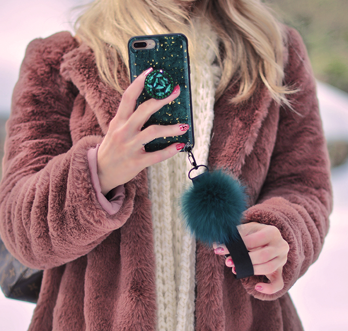 valentine's day nails, green iphone case with gold flecks and fur strap