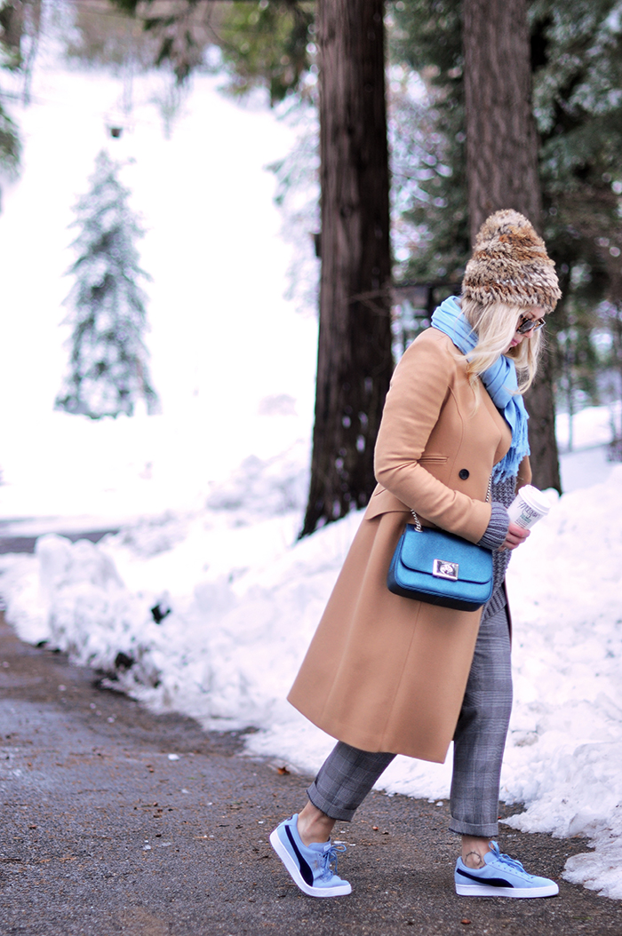 winter style in the snow, camel coat, plaid pants, sneakers with everything, love maegan tintari