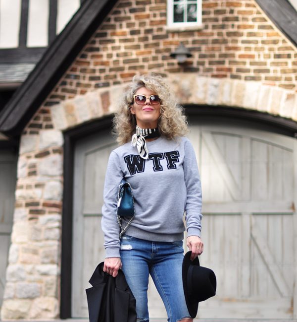 casual style-WTF-sweatshirt -bootcut jeans-hat-big curly blonde hair - love maegan tintari