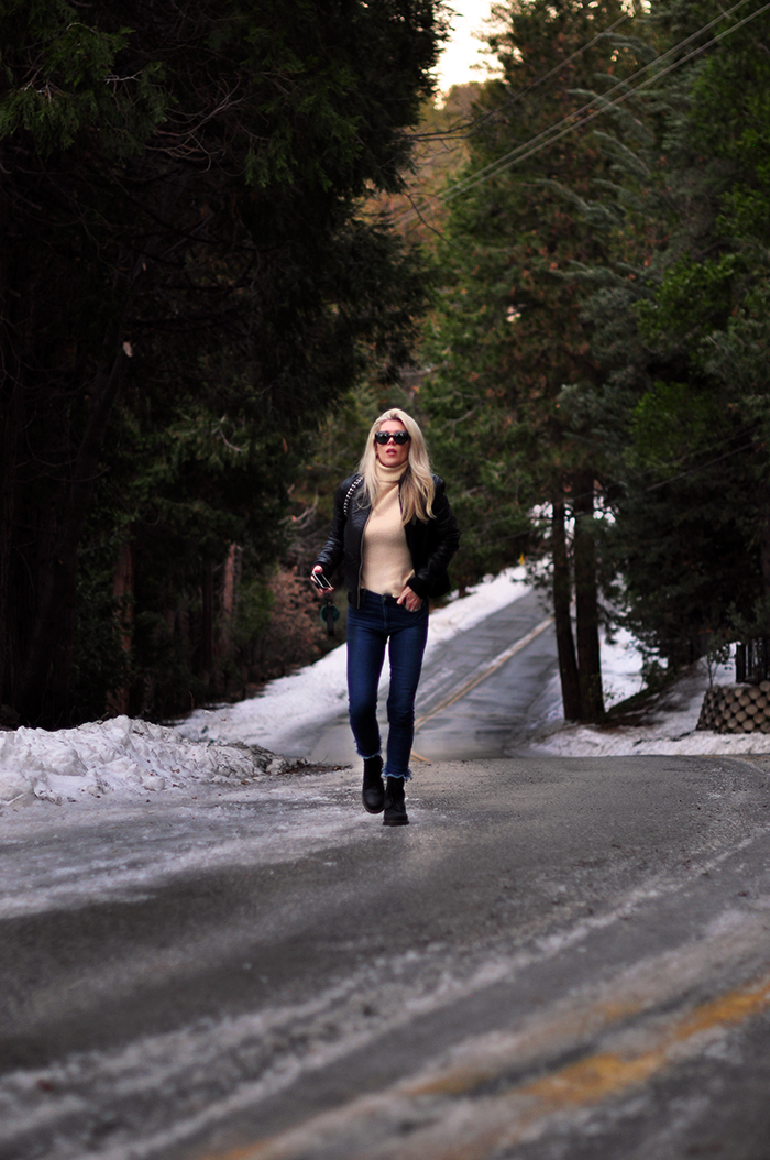 winter outfits in the snow with dr martens boots and jeans