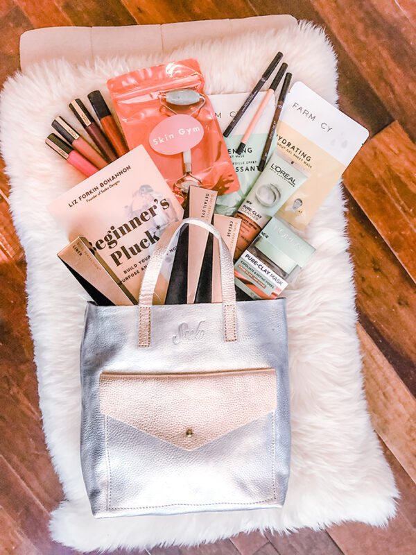 love Maegan blogger giveaway - leather bag-book-makeup-beauty products