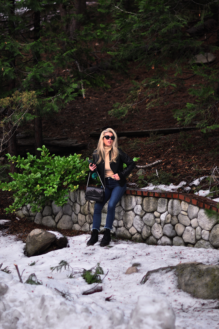 winter outfits in the snow with dr martens boots and jeans