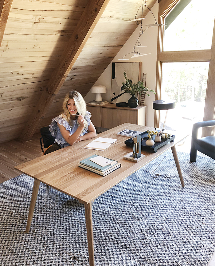 sitting at desk-mid century modern mountain house office