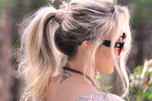 how to wrap your ponytail base with braids to disguise your hair ties