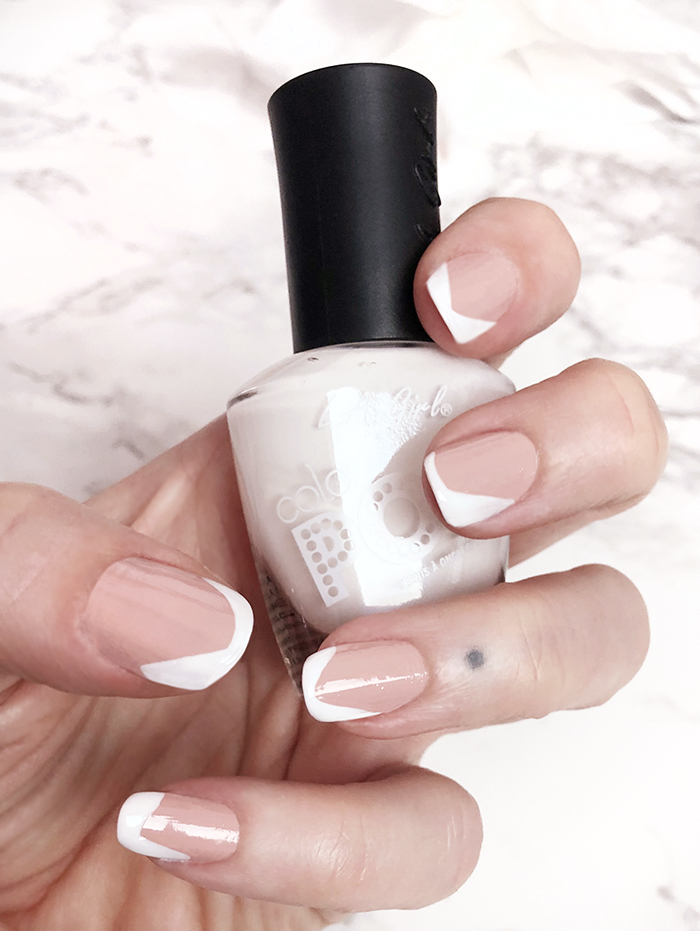 abstract french tip manicure with dots - neutral nail art