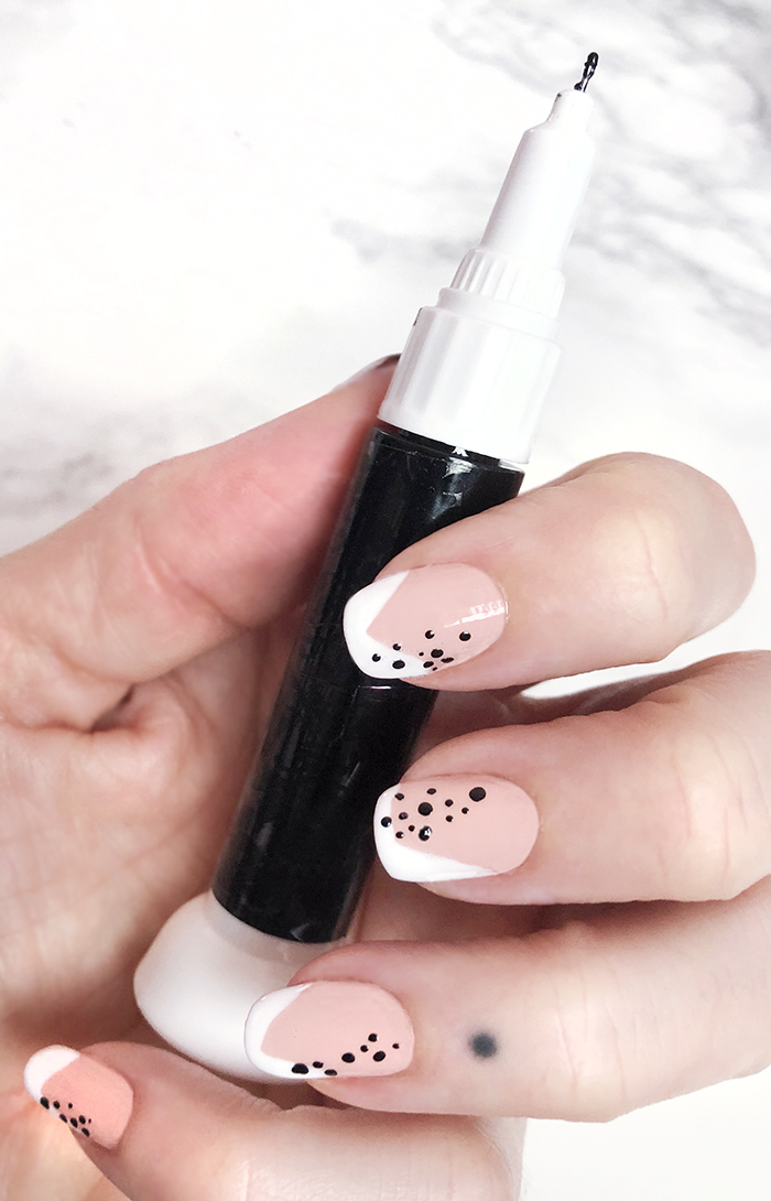 abstract french tip manicure with dots - neutral nail art