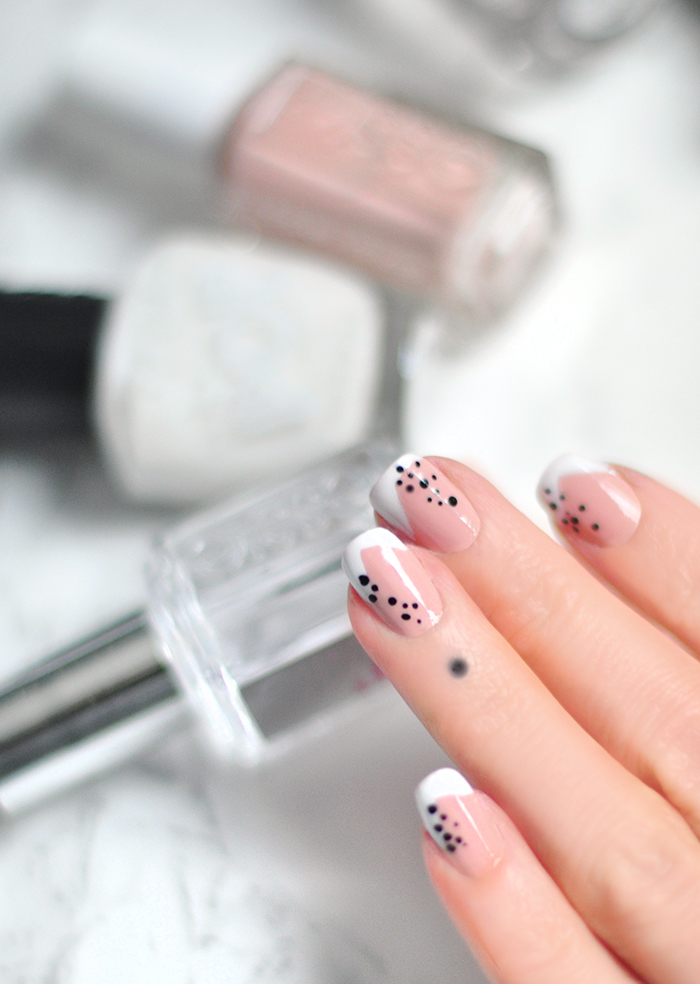 abstract french tip manicure with dots - neutral nail art