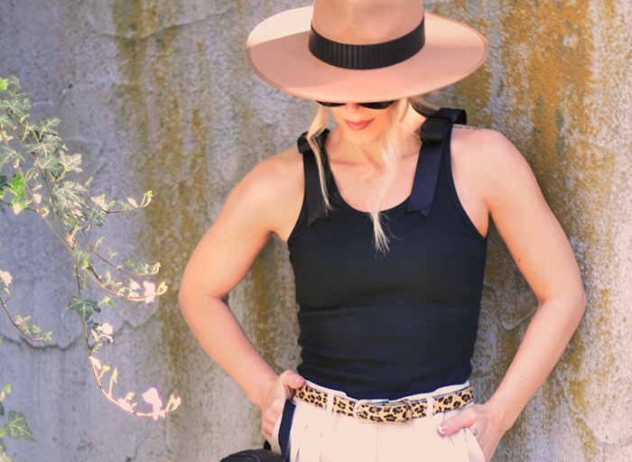 black ribbed tank top with bows on the shoulders