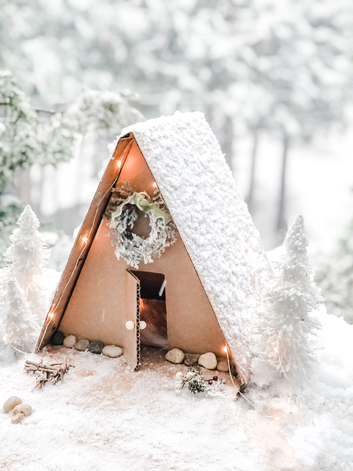 DIY mini a-frame winter cabin in the snow