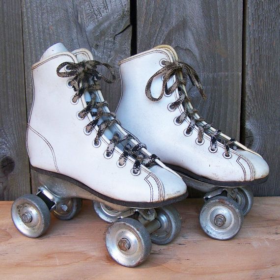 vintage roller skates with metal wheels