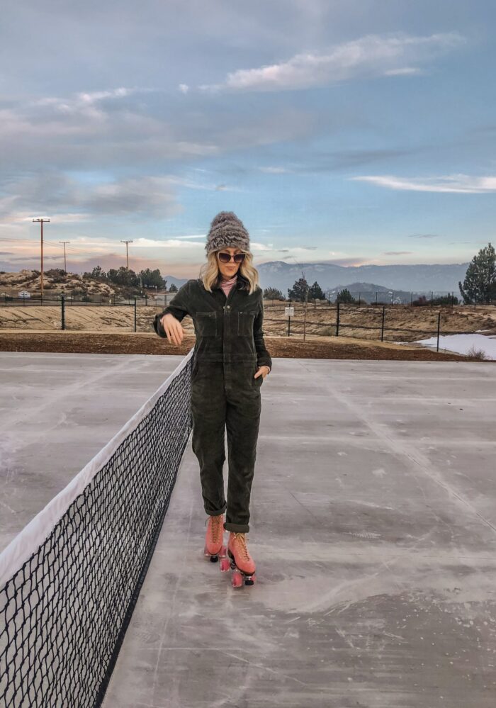 roller skating at sunset in lake arrowhead on pink moxi lolly roller skates and corduroy lee coveralls in the winter