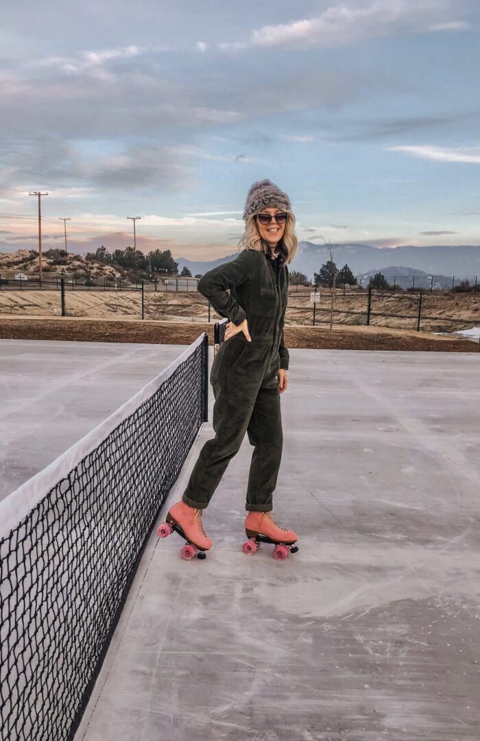 roller skating at sunset in lake arrowhead on pink moxi lolly roller skates and corduroy lee coveralls in the winter