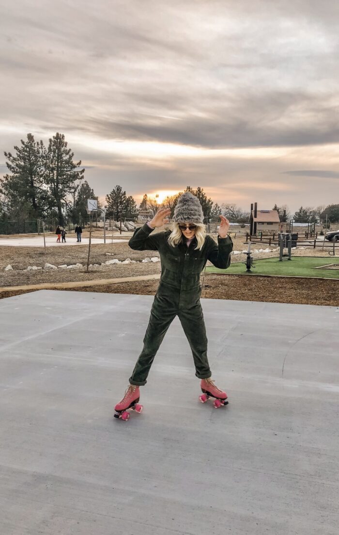 roller skating at sunset in lake arrowhead on pink moxi lolly roller skates and corduroy lee coveralls in the winter