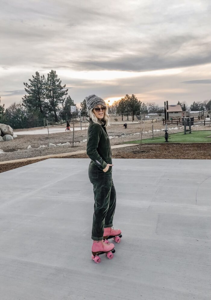 roller skating at sunset in lake arrowhead on pink moxi lolly roller skates and corduroy lee coveralls in the winter