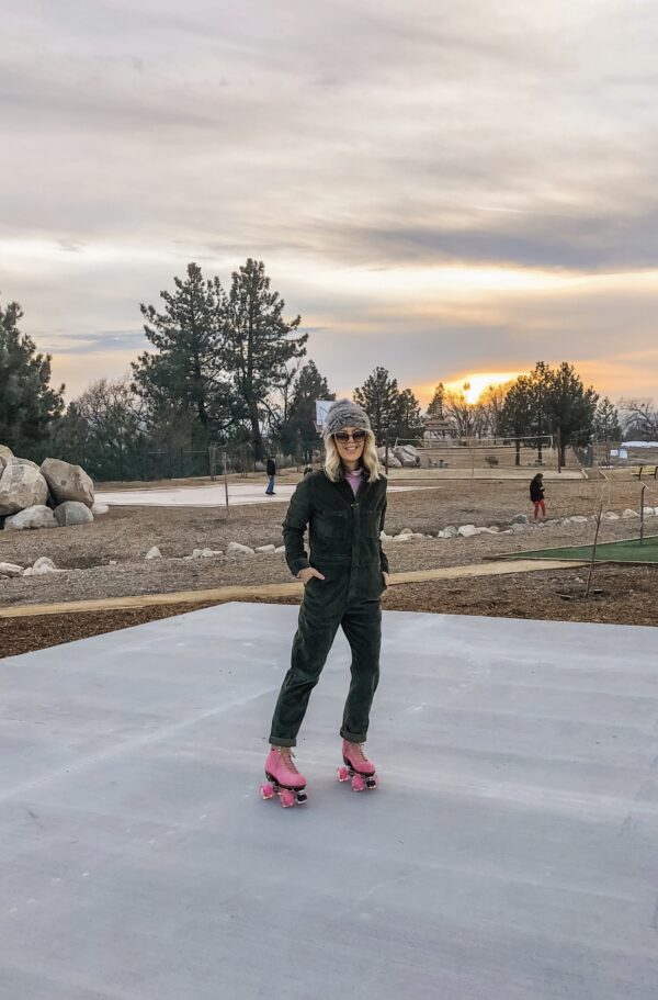 roller skating at sunset in lake arrowhead on pink moxi lolly roller skates and corduroy lee coveralls in the winter