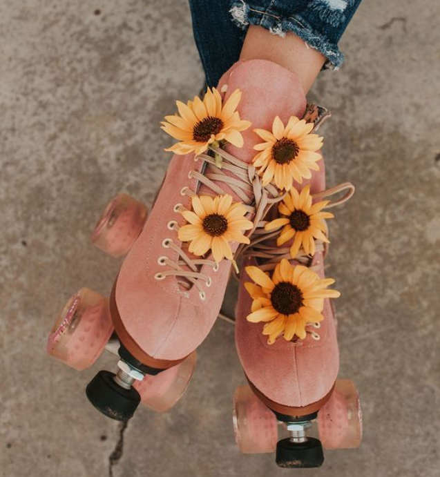 pink suede roller skates with sunflowers - moxi skates 