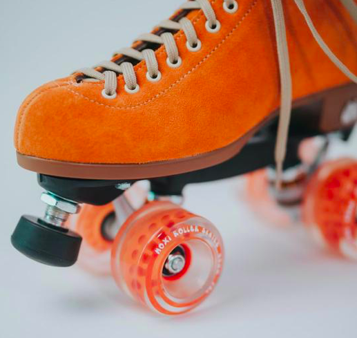 moxi roller skates in clementine and orange wheels