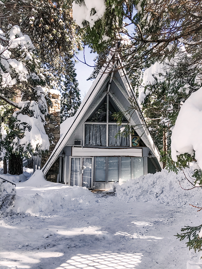 a-frame cabin in the snow in lake arrowhead, love maegan's office