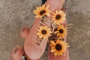 pink suede roller skates with sunflowers - moxi skates.jpg
