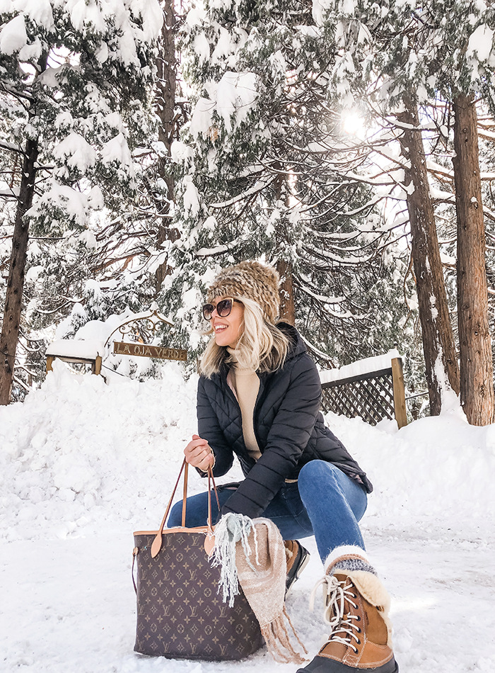 easy winter style outfit in the snow, jeans and turtleneck, puffer jacket, louis vuitton neverfull mm, snow boots, snow outfits, love maegan blog, lake arrowhead, snow days