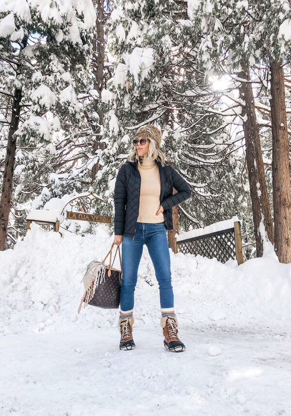 winter style snow outfit-puffer jacket-jeans-snow capped trees-louis vuitton bag-love maegan blog- lake arrowhead
