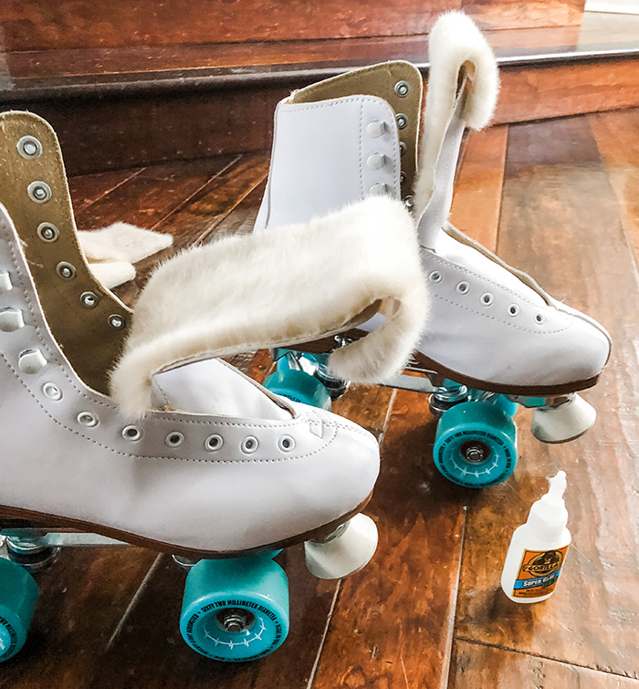 DIY Faux fur roller skate lining, how to get your skates to fit better when they're too big, white retro roller skates with teal bont wheels and derby laces