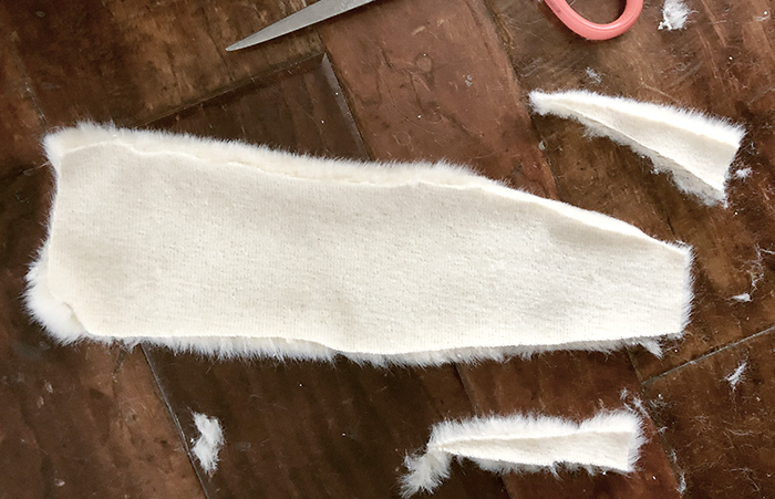 DIY Faux fur roller skate lining, how to get your skates to fit better when they're too big, white retro roller skates with teal bont wheels and derby laces