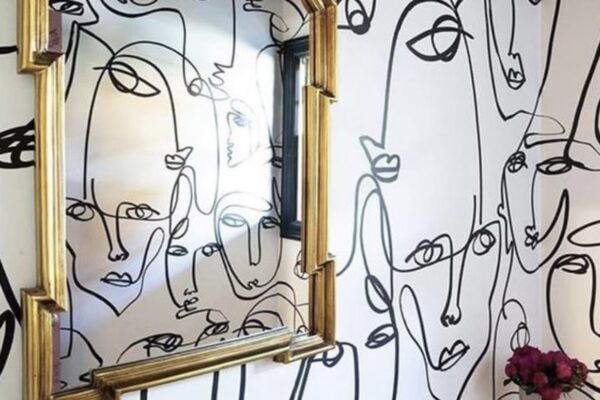 hand painting abstract line art faces on the wall, wallpaper alternative, painted wallpaper, powder room design ideas