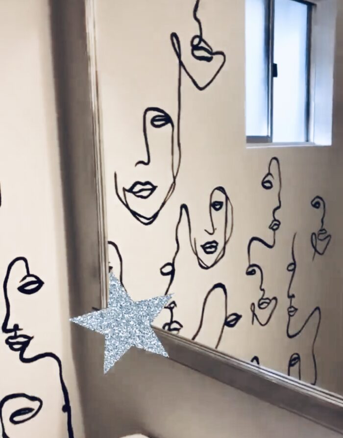 hand painting abstract line art faces on the wall, wallpaper alternative, painted wallpaper