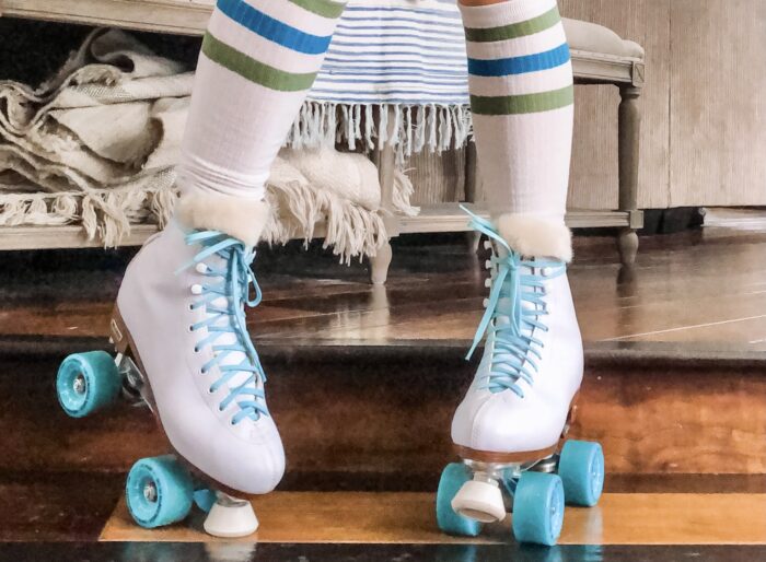 retro white roller skates with teal bont wheels and derby laces with faux fur tongue, how to get your skates to fit better, when your skates are too big here is a solution