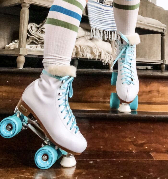 retro white roller skates with teal bont wheels and derby laces with faux fur tongue, how to get your skates to fit better, when your skates are too big here is a solution