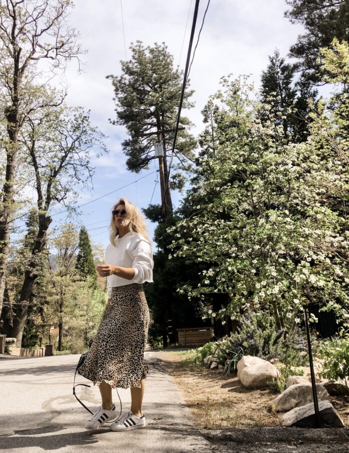 spring style, leopard slip dress with cropped sweatshirt and adidas sneakers, lake arrowhead, dogwood trees blooming