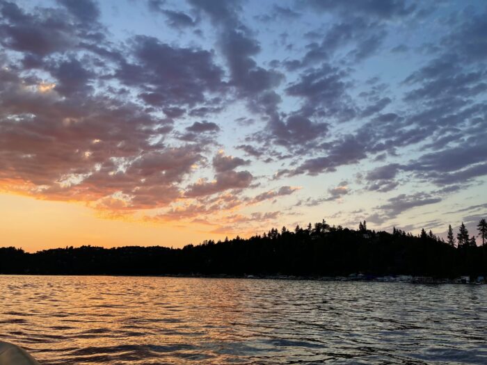 pink sunset on the water over the lake in lake arrowhead