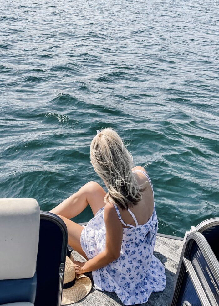 white sundress with blue flowers, on the lake, lake arrowhead, water, seascape, lakes in california, lakes near los angeles, summer style, lake life, lake dress, on a dock, boat life, docks in lake arrowhead, summer fashion