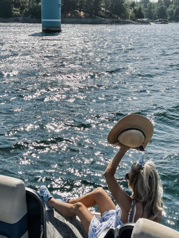 white sundress with blue flowers, on the lake, lake arrowhead, water, seascape, lakes in california, lakes near los angeles, summer style, lake life, lake dress, on a dock, boat life, docks in lake arrowhead, summer fashion