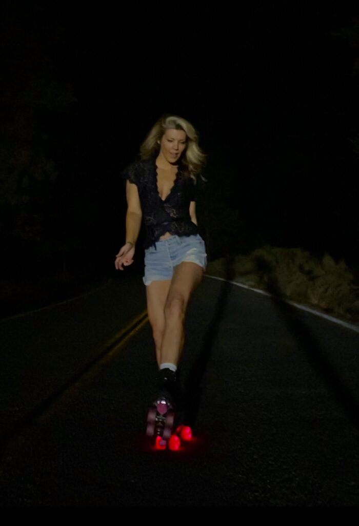 levis cut off jean shorts, lace wrap top, moxi roller skates, moxi jack boots, black suede roller skates, light up roller skate wheels, bont skate wheels, glow wheels, pink wheels, street skating, night skating, girl roller skating, dark streets, lake arrowhead, california